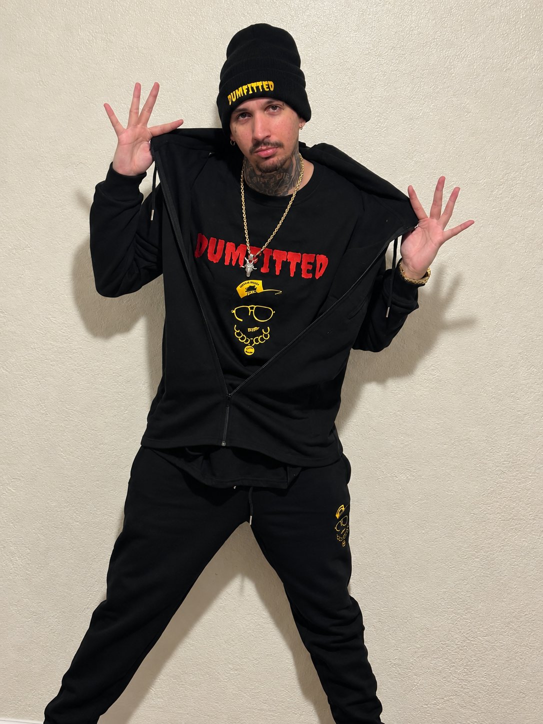 D~Game wearing his own merch